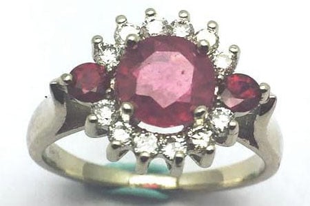 Ladies ruby and diamond ring in 14k white gold